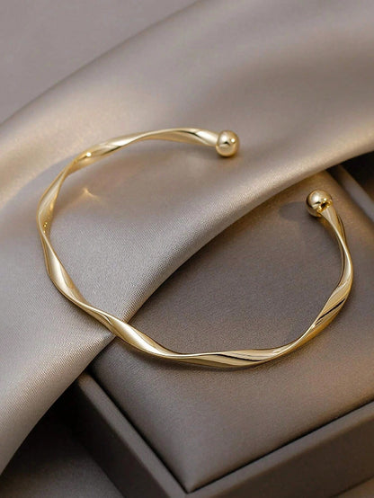 Twist Knot Design Metal Bangle